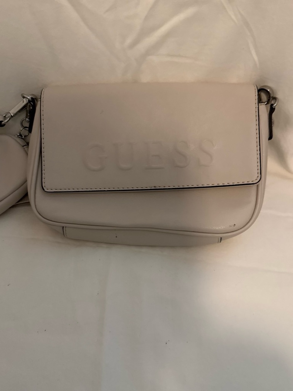 GUESS Cream Crossbody Bag with Embossed Logo